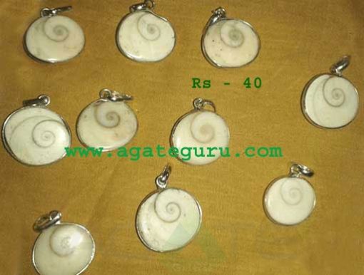 Momti Chakra Ring Pendants.